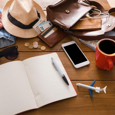 set-of-travel-things-on-wooden-background.jpg